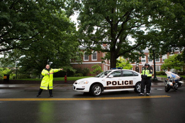 Friendly UVA police officers directing traffic