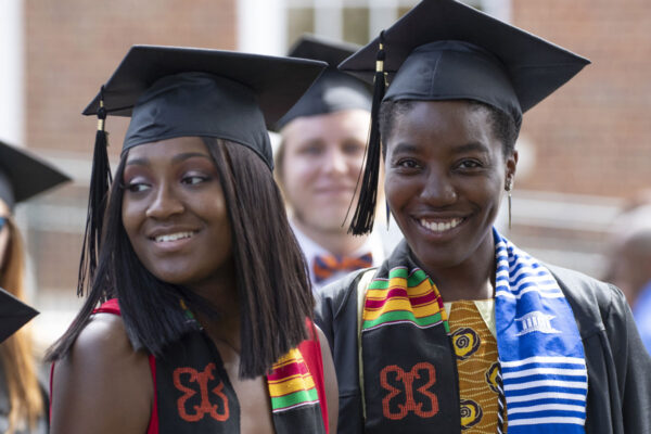 Black students in graduation regalia at Final Exercises