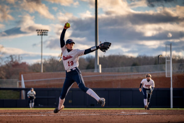 UVA softball player delivering a pitch