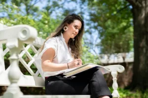 Clare Spooner working in one of the gardens.