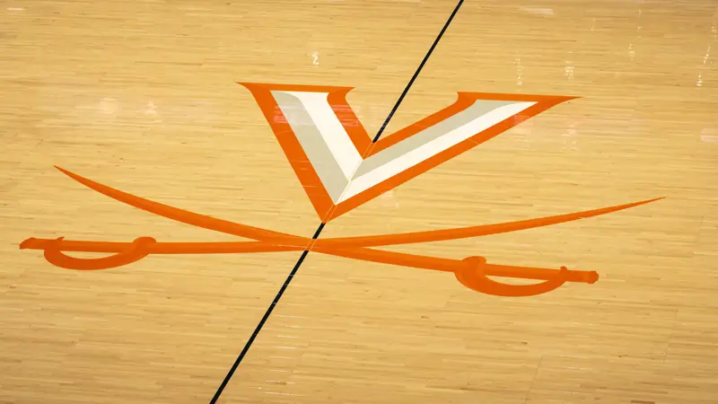 Desktop background: V saber logo at halfcourt of JPJ arena